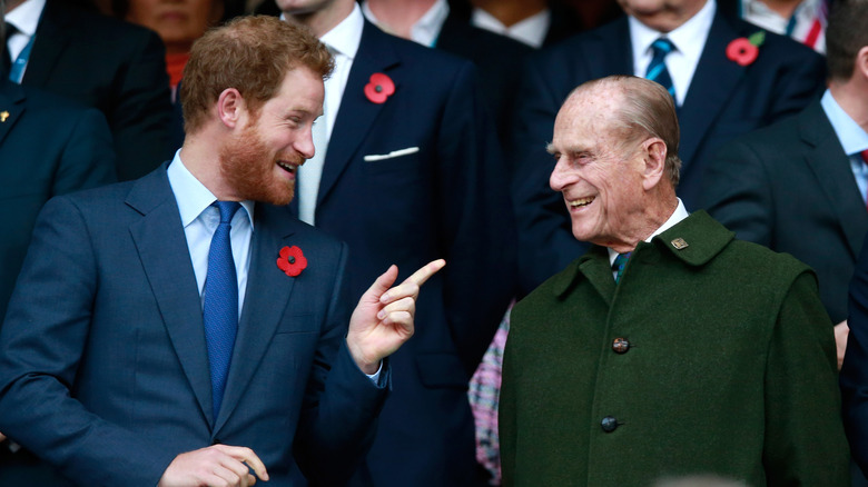 Prince Harry and Prince Philip sharing a laugh