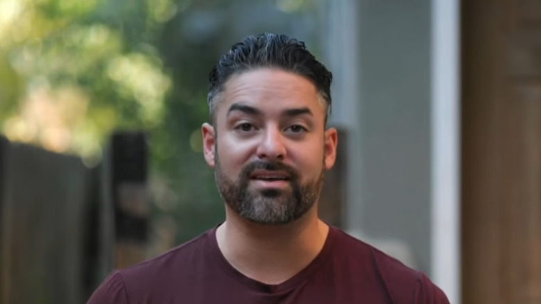 Rico León smiling in close-up