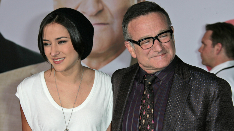 Zelda Williams and Robin Williams smiling