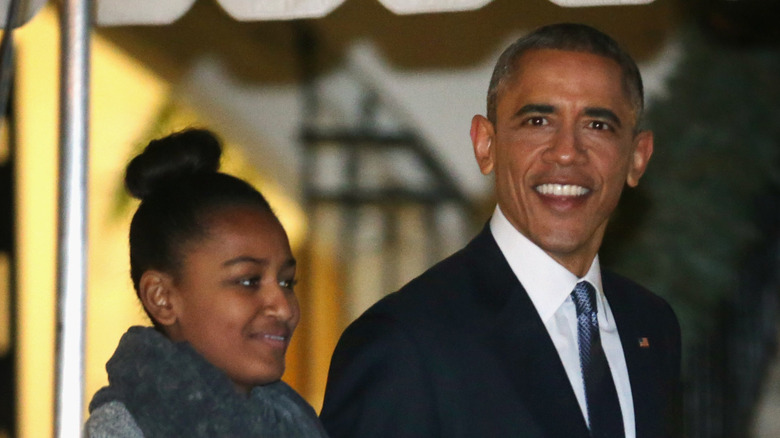 Sasha Obama and Barack Obama