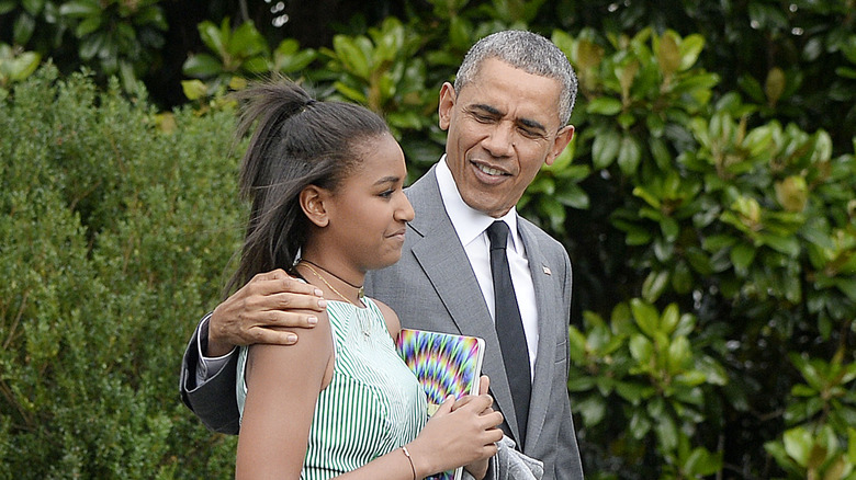 Sasha Obama and Barack Obama