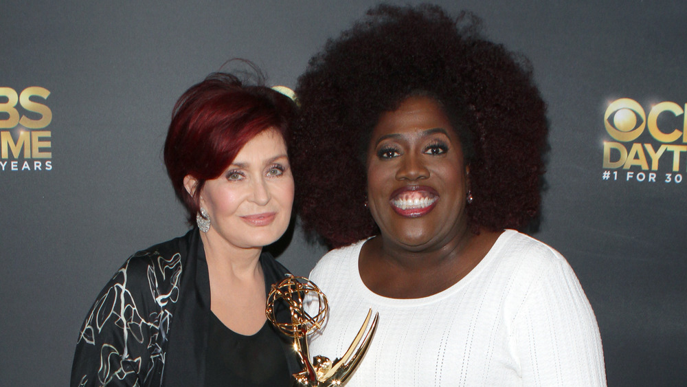 Sharon Osbourne and Sheryl Underwood smiling at an award show