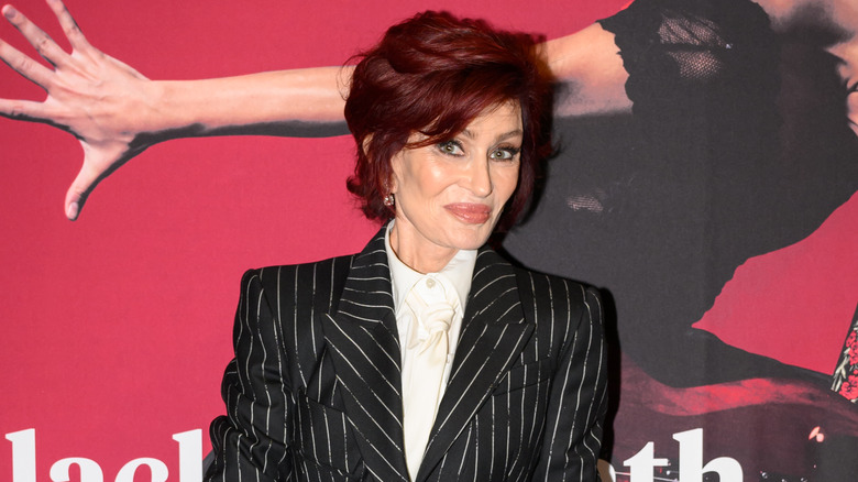 Sharon Osbourne wearing a black suit