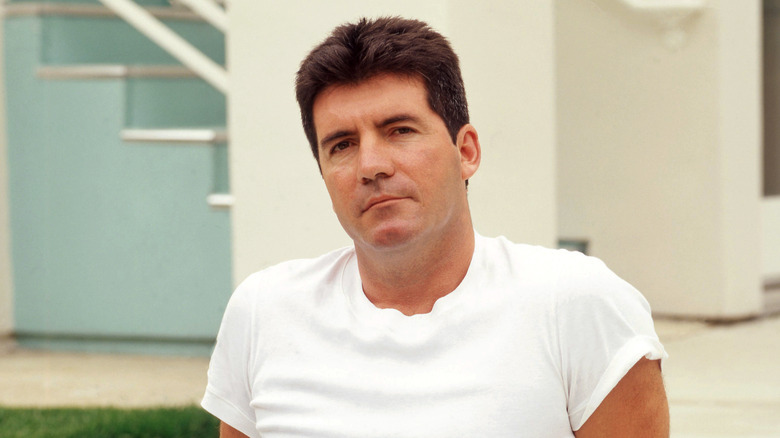 Simon Cowell posing white T-shirt