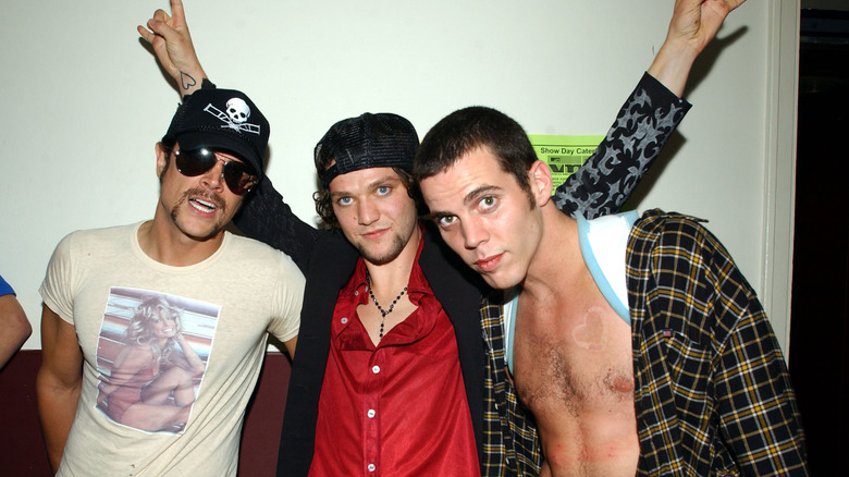 Johnny Knoxville, Bam Margera, Steve-O, vintage photo of them together, not smiling 