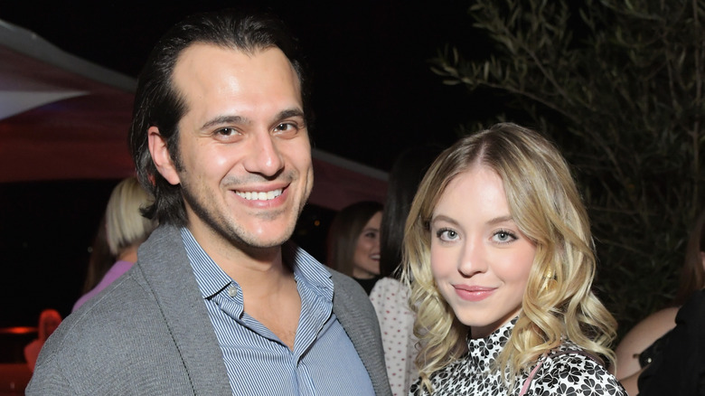 Jonathan Davino smiling with Sydney Sweeney