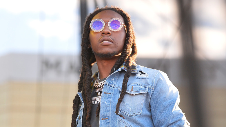 Takeoff performing at a festival
