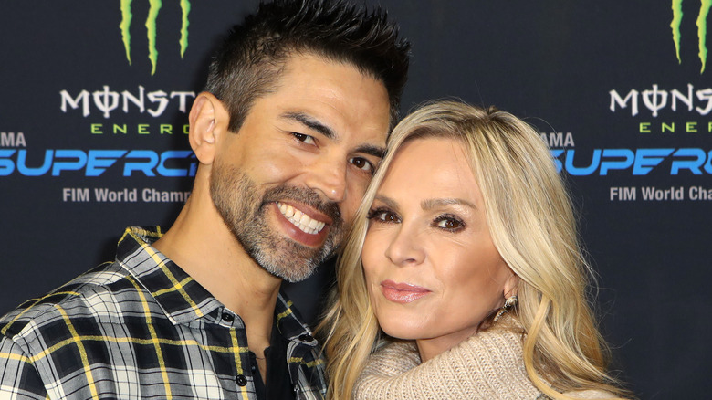 Eddie Judge and Tamra Judge smiling and posing together