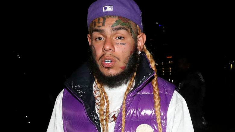 Tekashi 6ix9ine wearing purple 