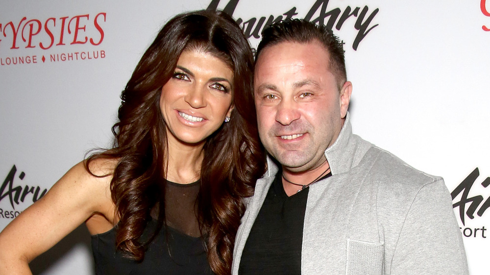 Teresa and Joe Giudice smiling at an event