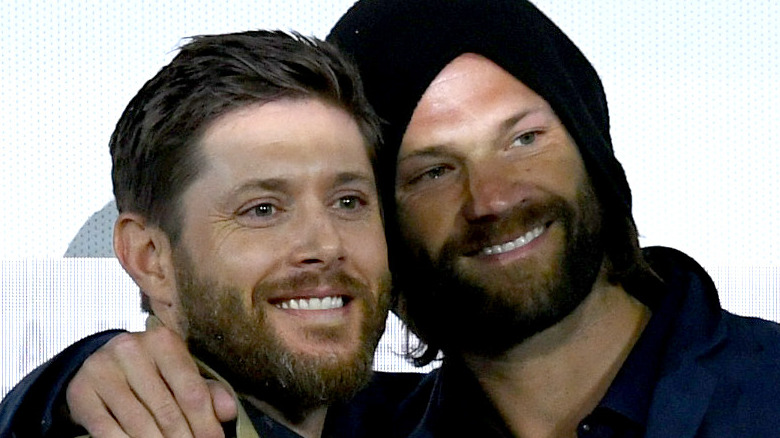 Jensen Ackles and Jared Padalecki leaning in