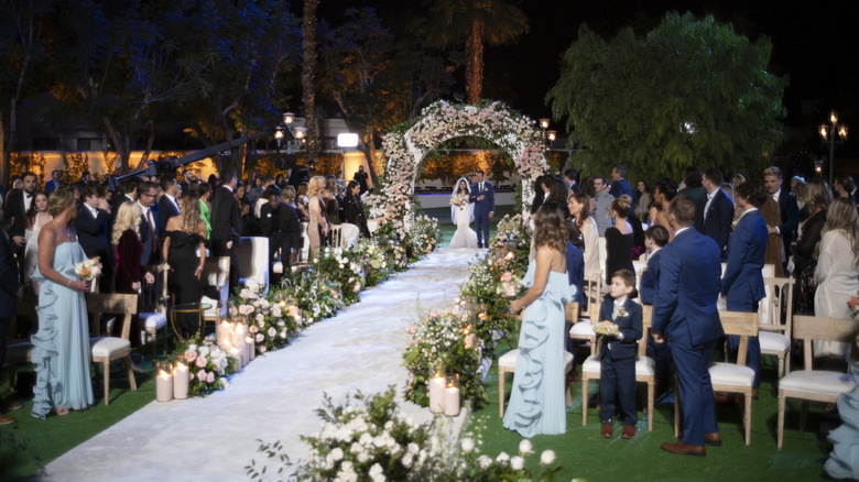 Tommy Nist walking his mother Theresa Nist down the aisle during The Golden Wedding