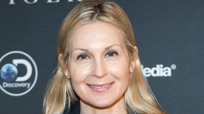 Kelly Rutherford at an event, smiling