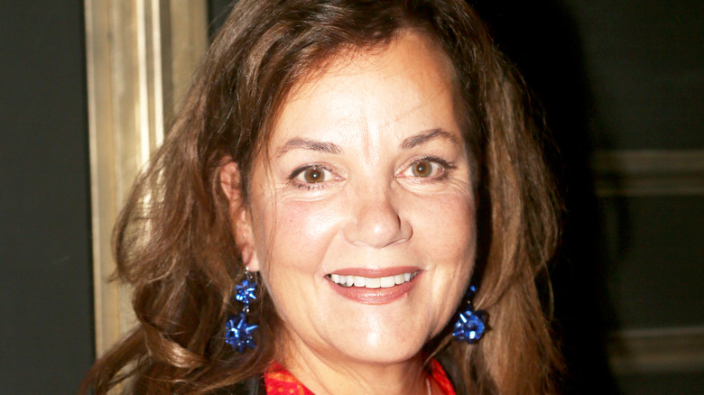 Margaret Colin at an event, smiling