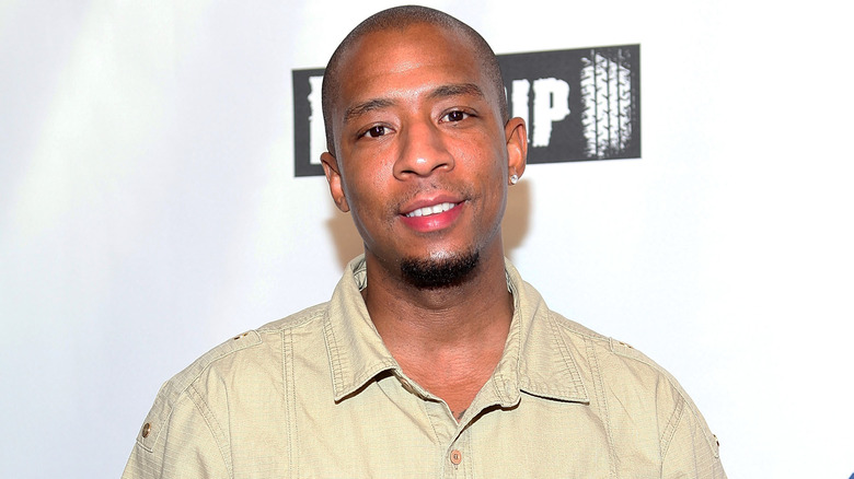 Antwon Tanner smiling at event