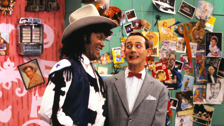 Laurence Fishburne smiles at Pee-wee Herman