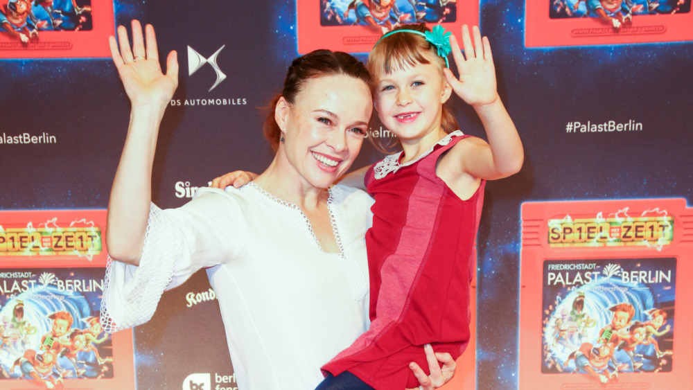 Tami Stronach posing for photos with her daughter