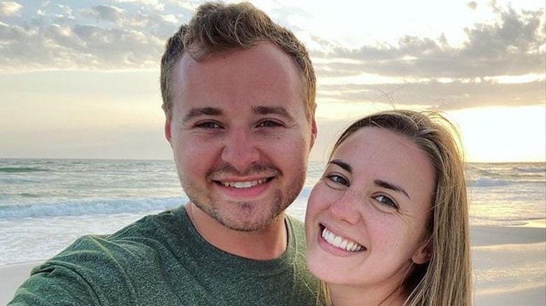 Jedidiah and Katey Duggar smiling at the beach