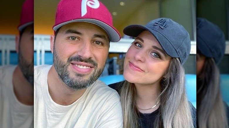 Jinger and Jeremy Vuolo wearing hats