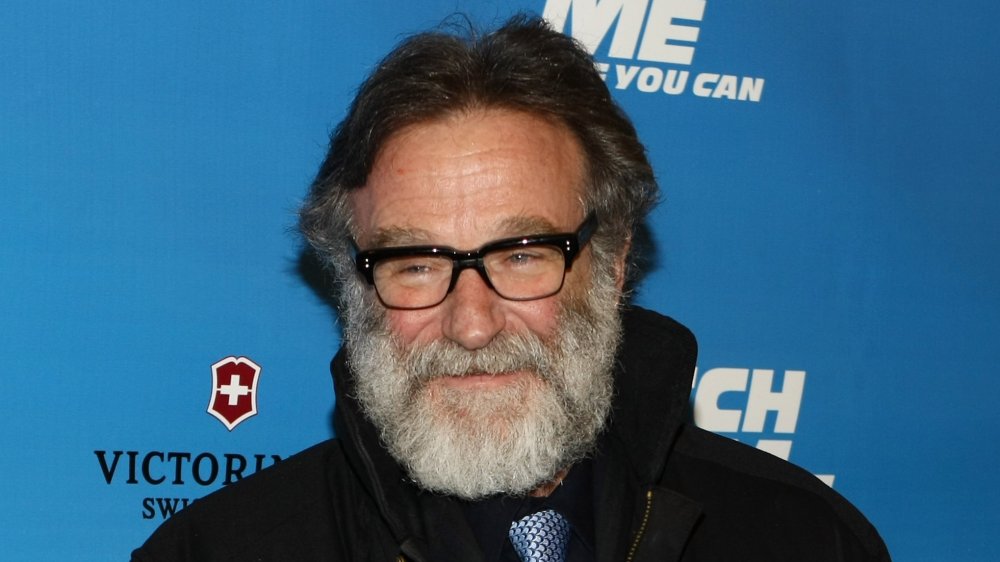 Robin Williams smiling at the opening night of "Catch Me If You Can" on Broadway