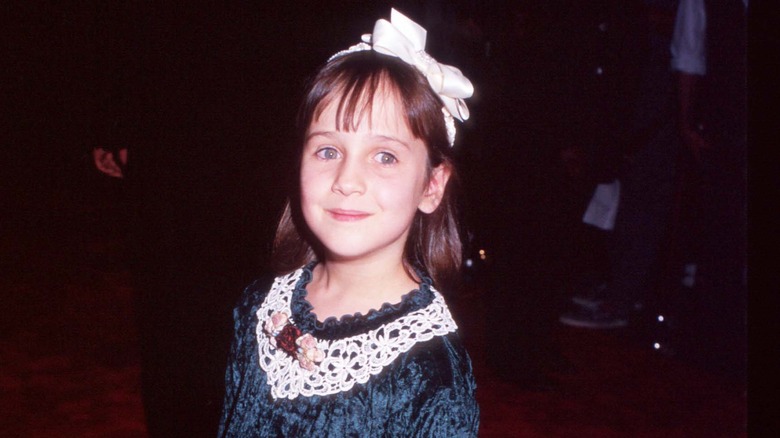 Young Mara Wilson smiling