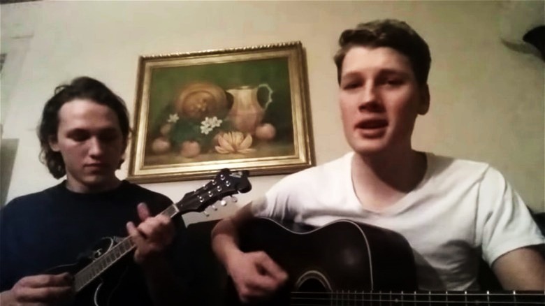 Jacob, James Stockdale playing guitar