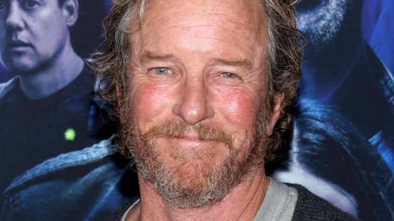 Linden Ashby beard curly hair red carpet, smiling