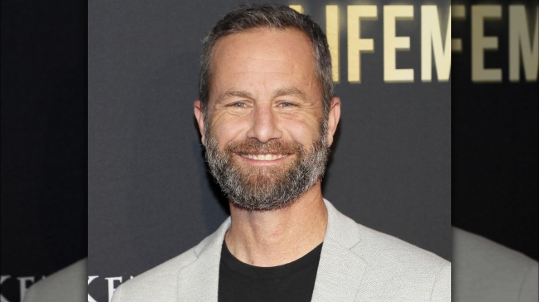 Kirk Cameron smiling on red carpet