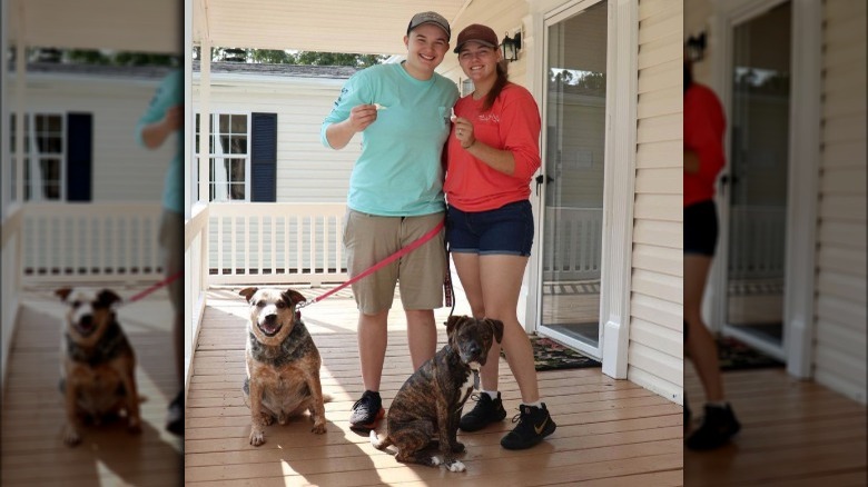 Hannah Roberts holding keys with Kelsey Miller