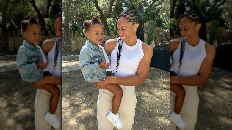 Allyson Felix holds her daughter