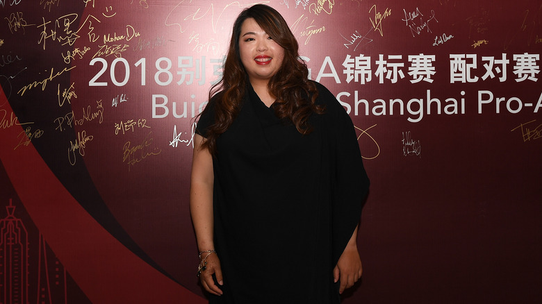 Shanshan Feng in a black dress