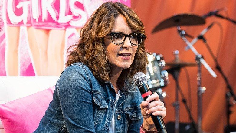 Tina Fey talking into a microphone