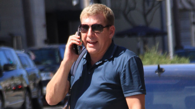 Todd Chrisley talking on the phone