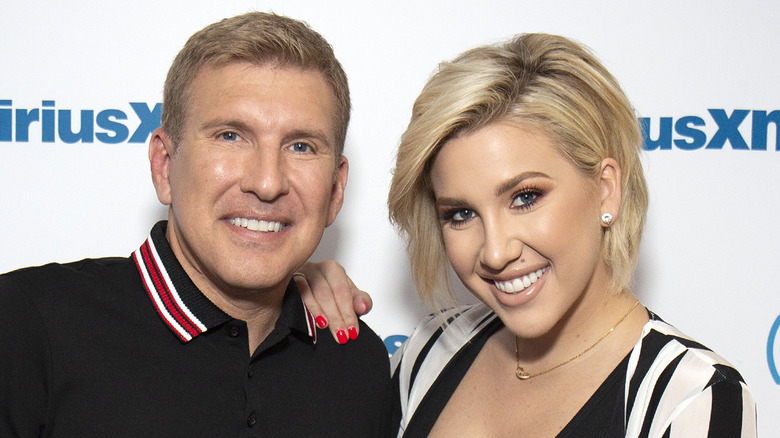 Todd and Savannah Chrisley posing together