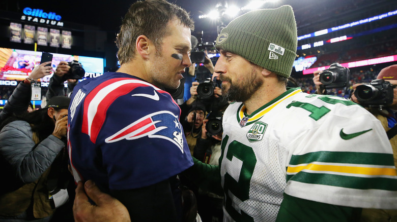 Tom Brady, Aaron Rodgers posing