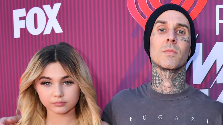 Travis Barker with his daughter Alabama on the red carpet