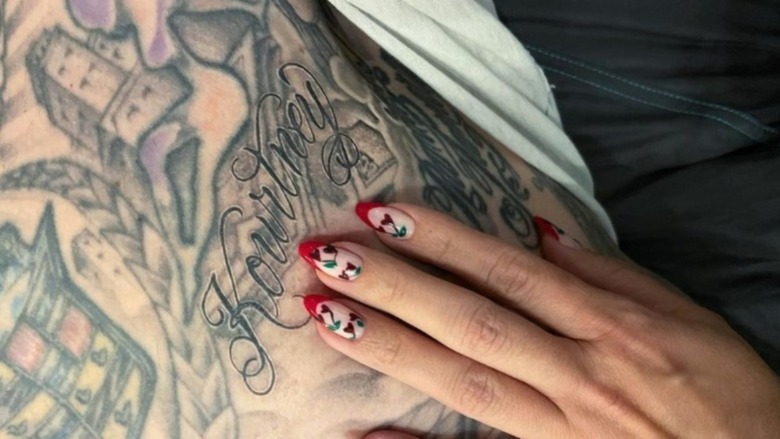 Travis Barker's Kourtney tattoo