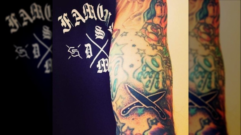 Travis Barker's knives tattoo