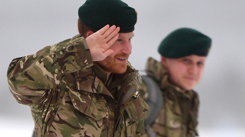 Prince Harry wearing army uniform saluting