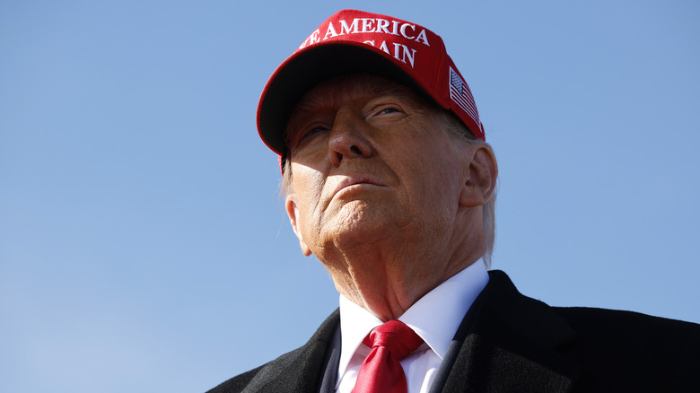 Donald Trump wearing a maga hat