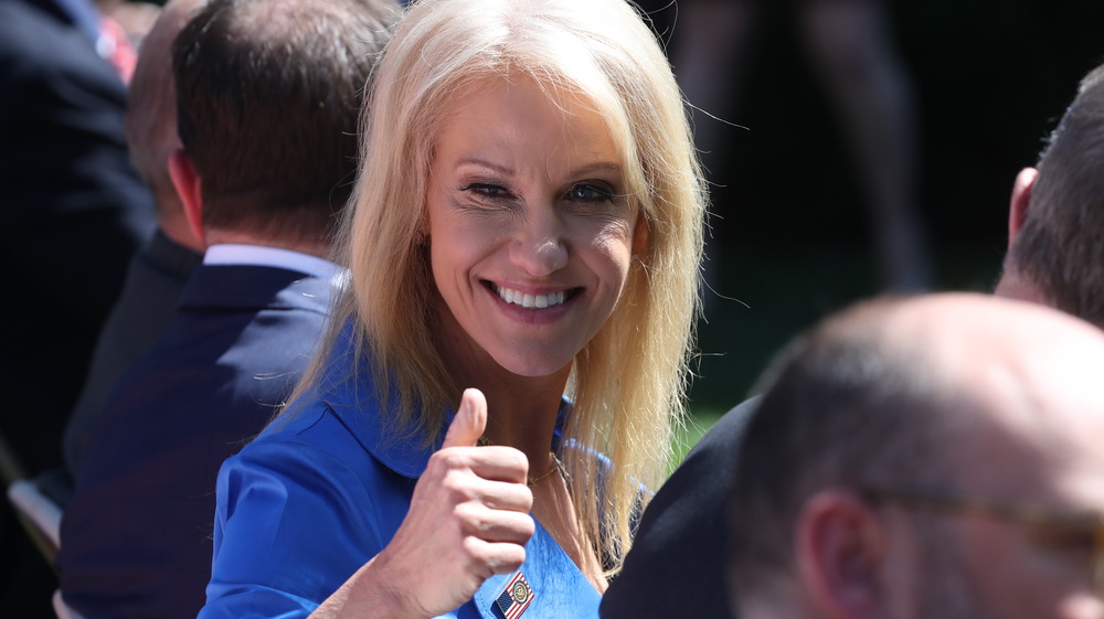 Kellyanne Conway winking and giving a thumbs up