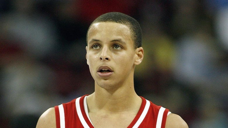 Young Steph Curry on basketball court