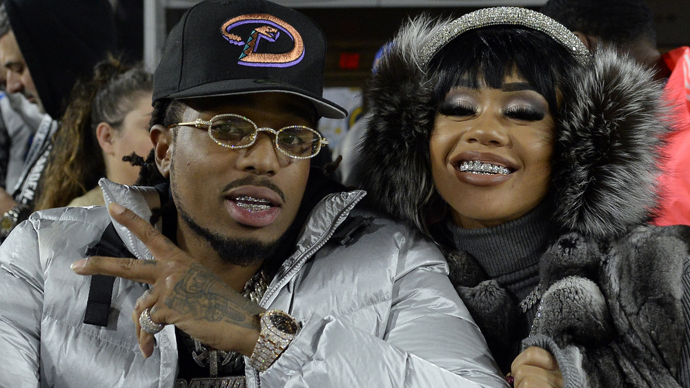  Quavo and Saweetie attend a football game between Baltimore Ravens and Los Angeles Rams