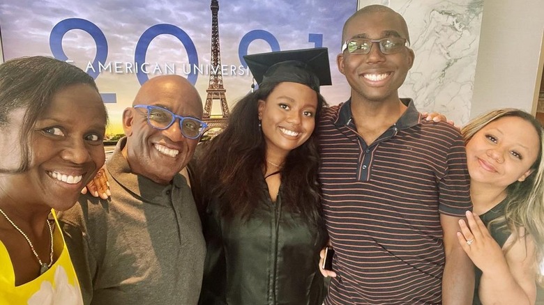 Al Roker and his wife posing with their kids