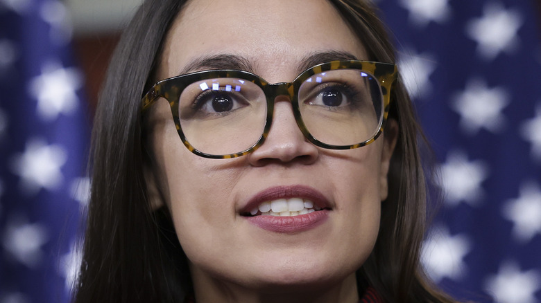 Alexandria Ocasio-Cortez brown rimmed glasses