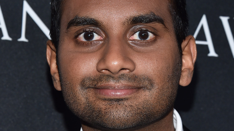 Aziz Ansari posing