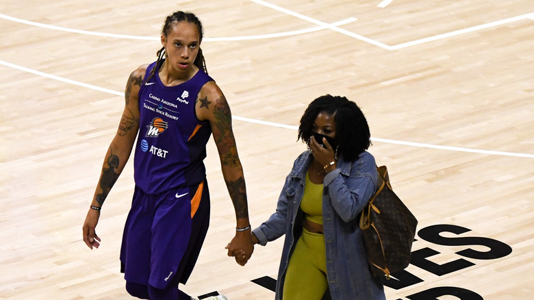 Brittney and Cherelle Griner holding hands