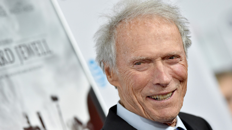 Clint Eastwood short hair grining