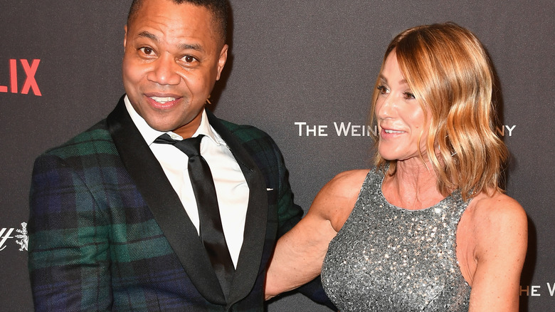 Cuba Gooding Jr. (L) and Sara Kapfer attend The Weinstein Company and Netflix Golden Globe Party