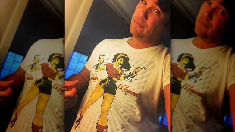 Dean Cain poses in Wonder Woman T-shirt